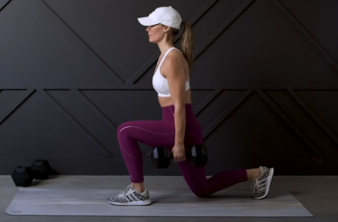 Woman doing lunges at home