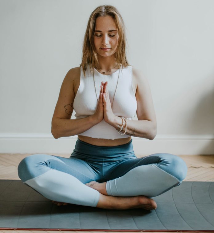 Woman doing restorative yoga