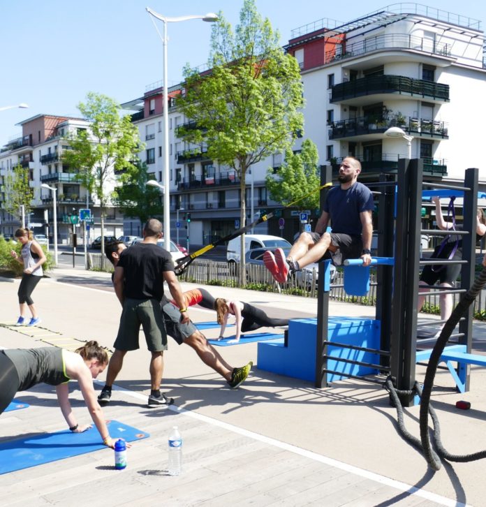 People working out in an outdoor gym