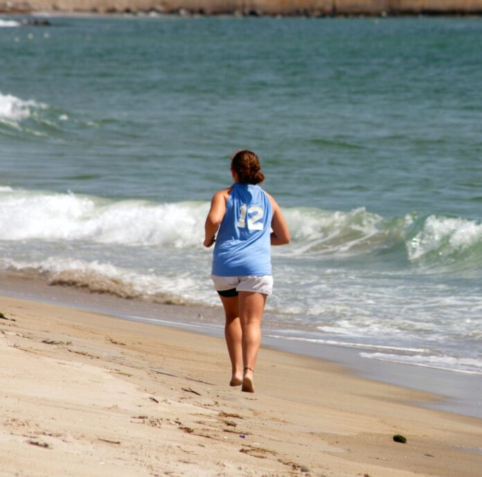 Girl running on beach